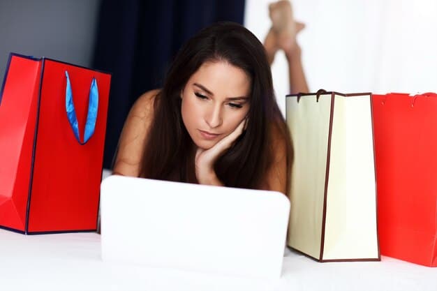 A frustrated shopper staring at a laptop screen. On the screen, there is an error message beside the delivery date displayed under an Amazon product. The shopper looks exasperated and confused. The background is a cluttered home office or living room filled with unopened shipping boxes, alluding to the chaos of the holiday shopping season.