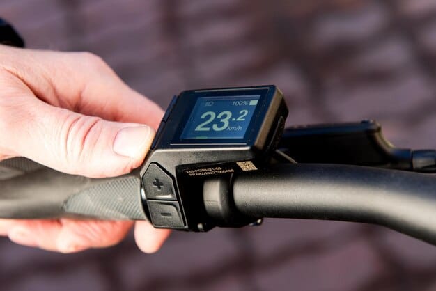 A close-up of an e-bike's digital display showing battery life, speed, and distance traveled. The display is bright and easy to read, even in direct sunlight.