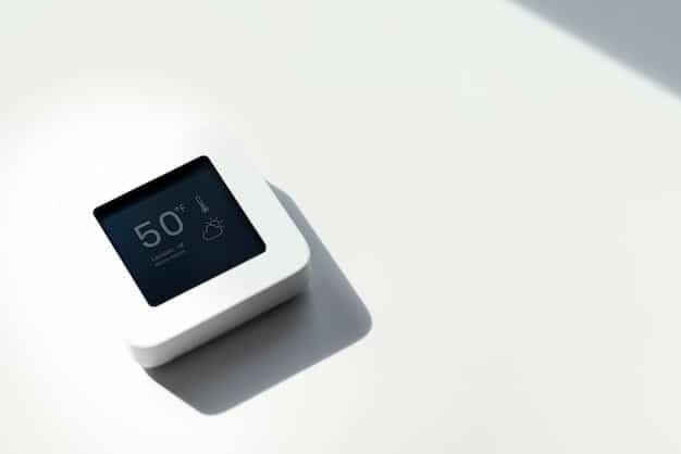 A close-up of a 2025 smart thermostat with an AI interface learning user preferences. The screen displays energy usage data and personalized temperature settings, showcasing the device's ability to adapt to individual needs.