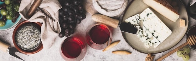 An aesthetically pleasing arrangement of Winc wine bottles set on a wooden table, accompanied by various cheeses, grapes, and crackers, creating a scene of a relaxed wine tasting.