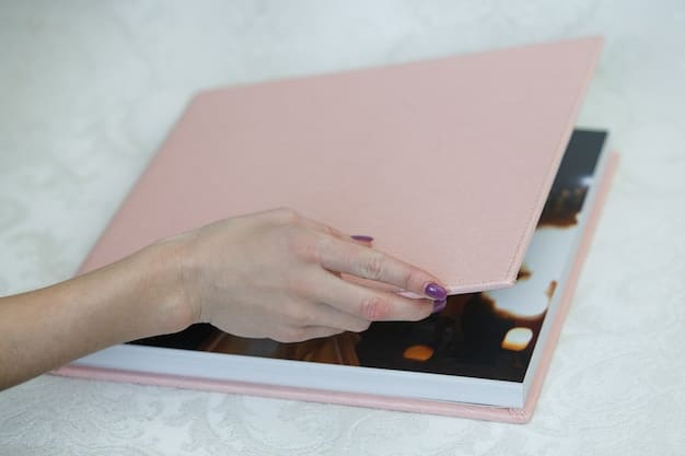 A person's hands carefully placing a personalized photo album on a bookshelf next to other cherished mementos, with soft lighting illuminating the scene, emphasizing the care and value of keepsakes.