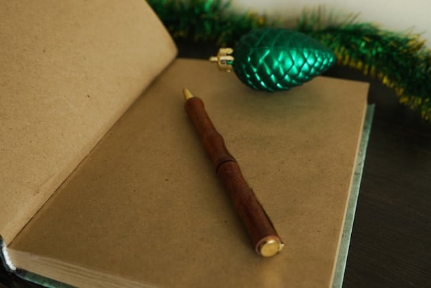 A close-up of a beautifully engraved wooden pen with the year '2025' and a graduate's initial, placed on a parchment roll with a graduation cap in the background, symbolizing personalized success.