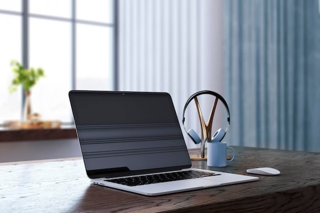 A sleek, modern laptop open on a desk next to a noise-canceling headphone, a portable power bank, and a minimalist smart water bottle, suggesting a productive and tech-savvy graduate's workspace.
